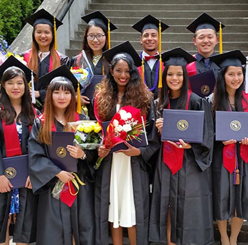 ѨƵ international students at graduation