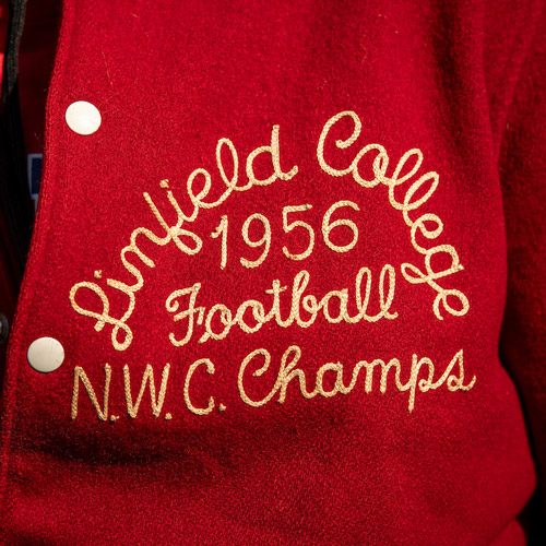 Letterman jacket embroidered with "ѨƵ College 1956 Football NWC Champs"